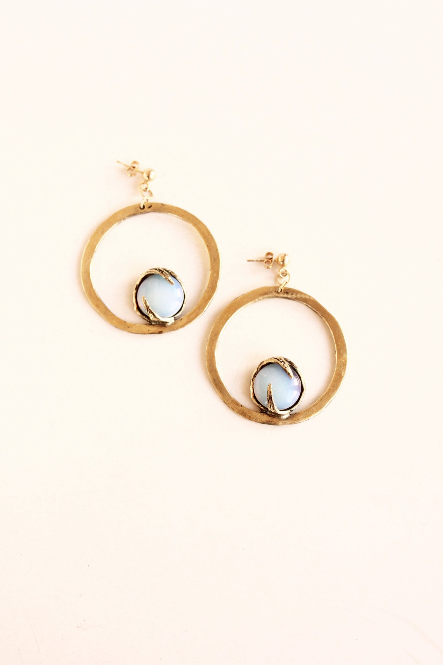 Statement circle earrings with opal crystals