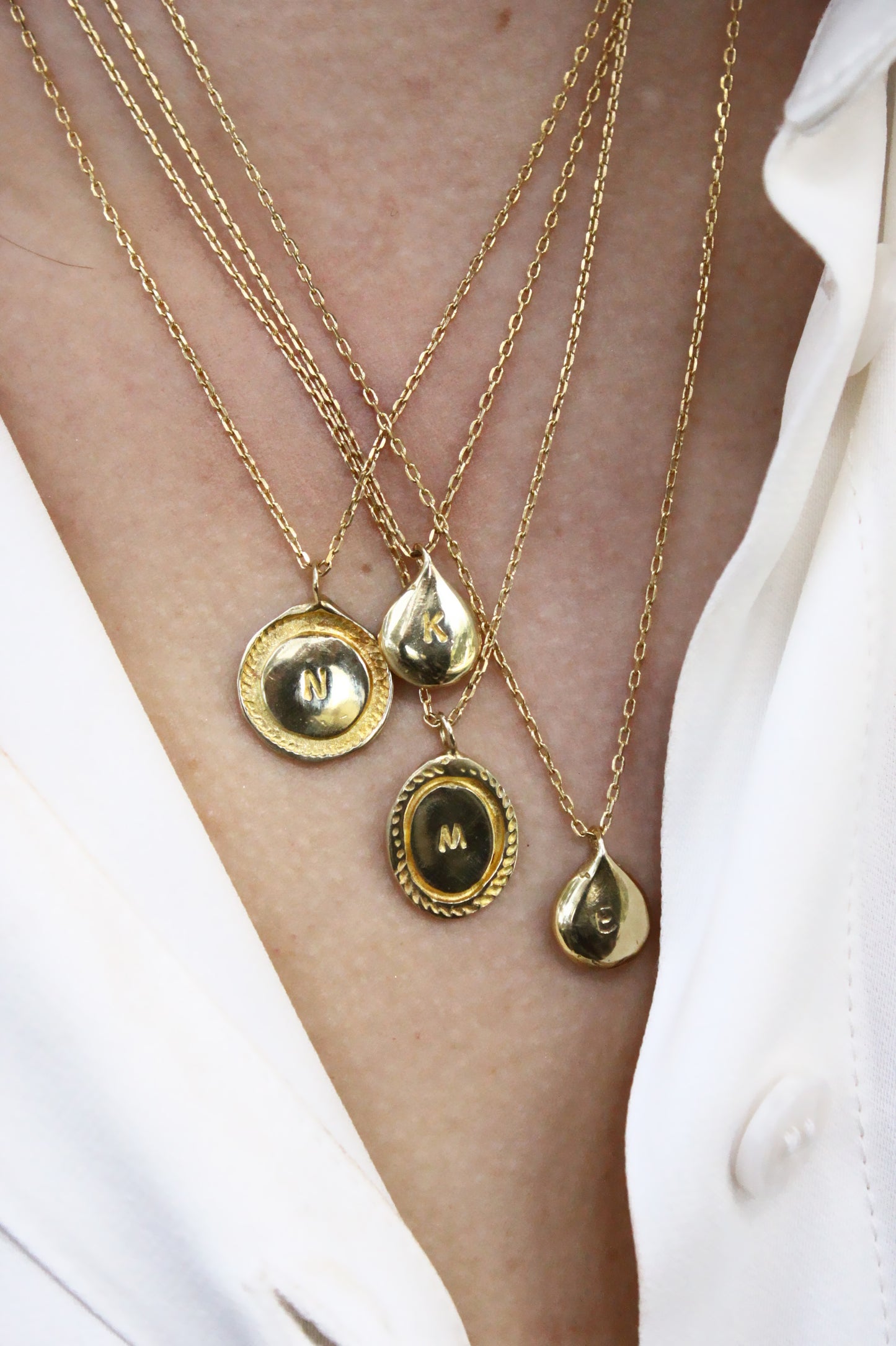 Gold necklaces with various personalized initials monogram
