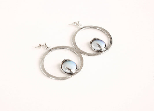 Pair of silver hoop earrings with opal stones