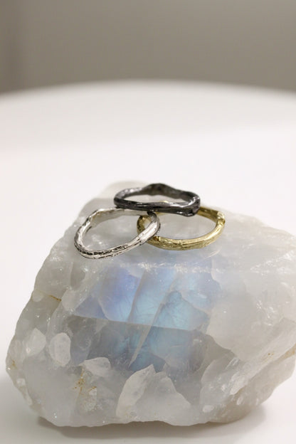 Three rings of different metals 
