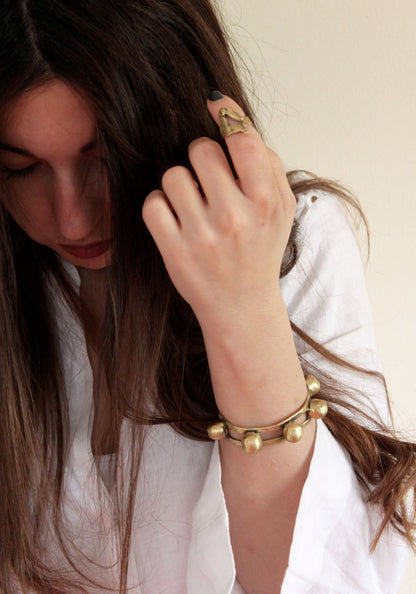 Woman wearing gold bracelets