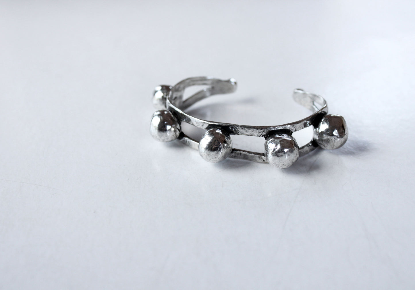 Silver bracelet with spherical beads