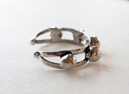 Silver cuff with a textured design