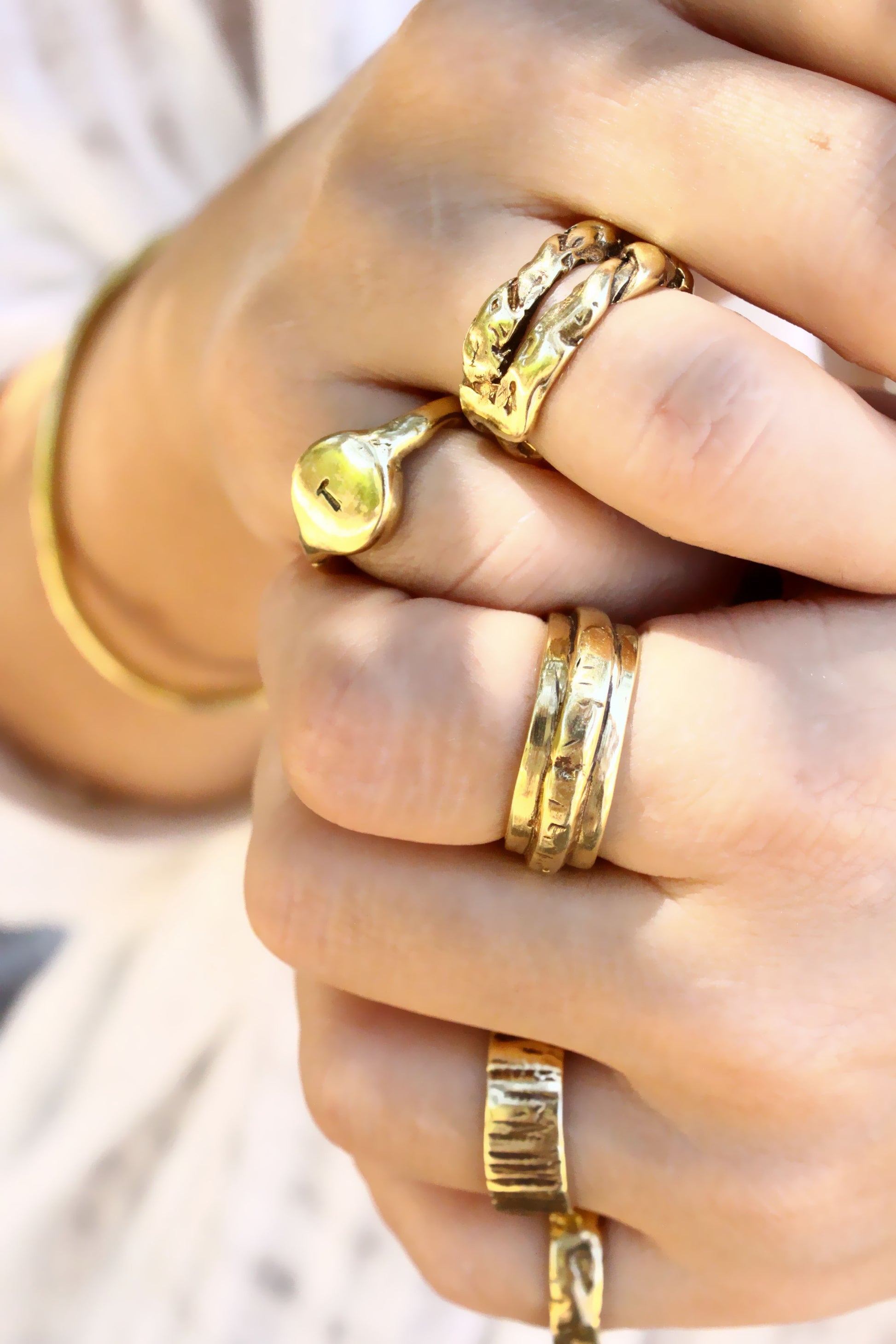  multiple gold rings 