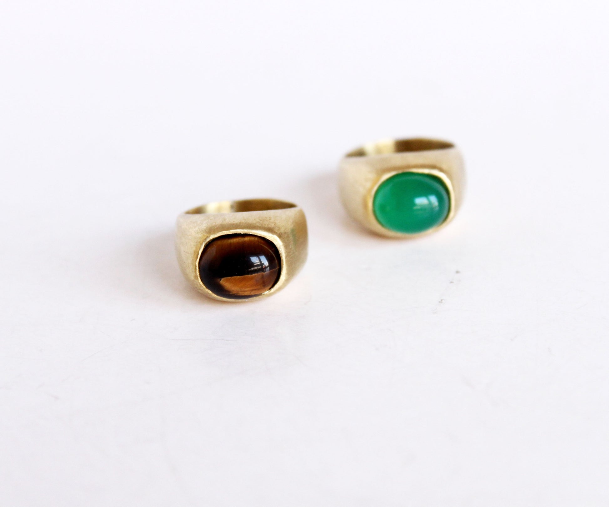 Two matte rings with gemstones 