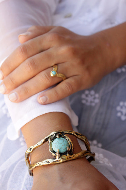 gold ring and bracelet with turquoise stones.