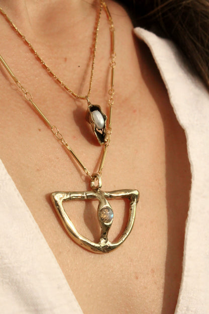 Gold necklace with a pendant