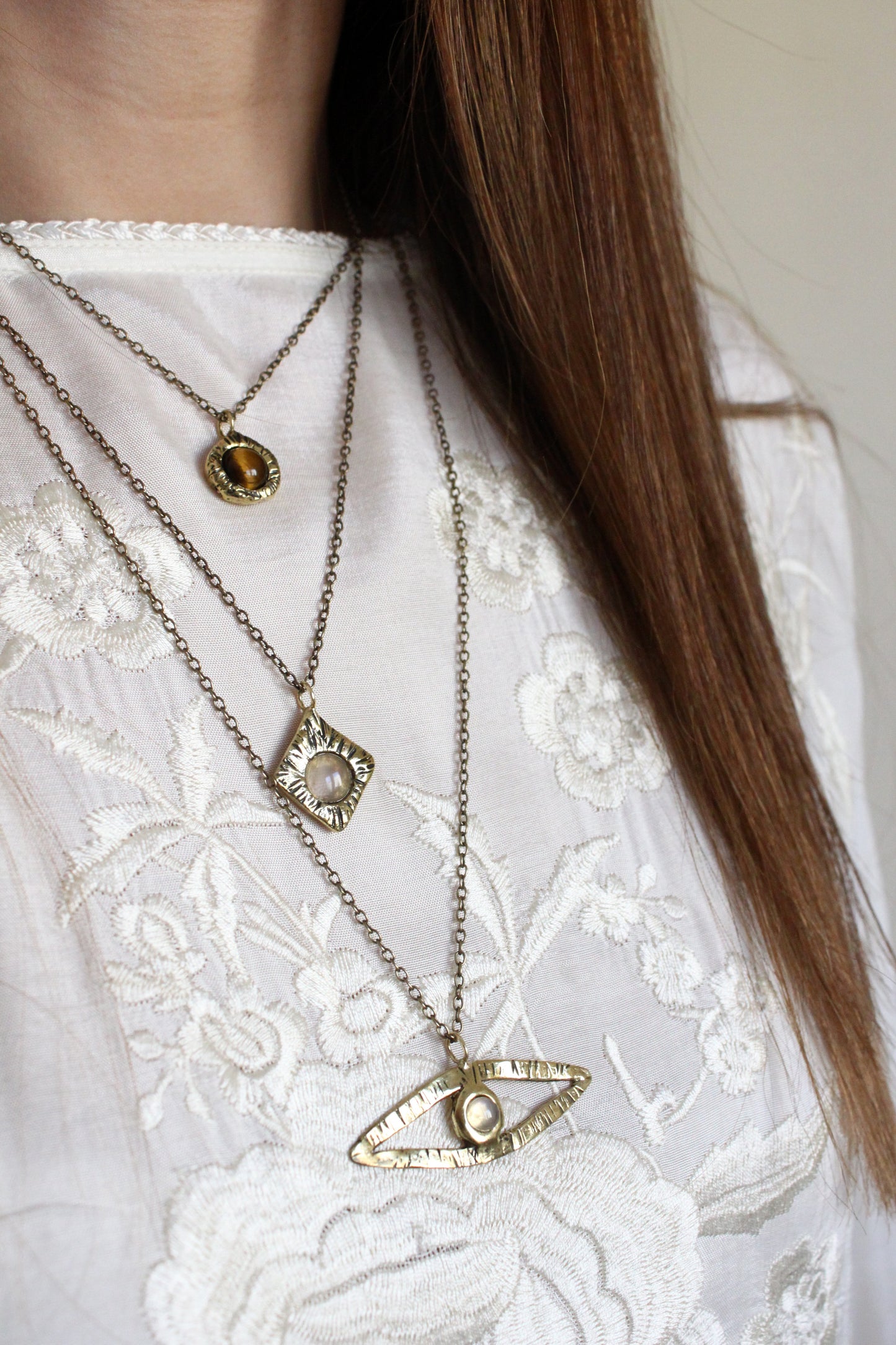 Layering minimal necklaces with stones