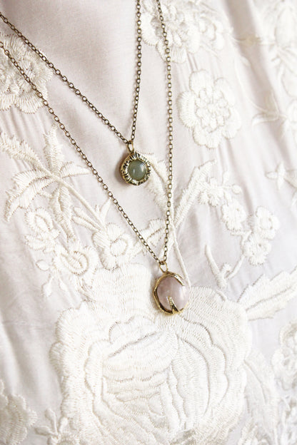 Necklace with two pendant stones aventurine and rose quartz.