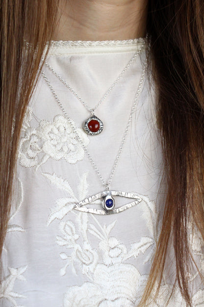 Necklaces with red and blue lapis lazuli gemstones 