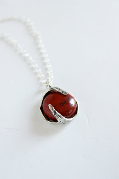Necklace with a red jasper stone pendant 