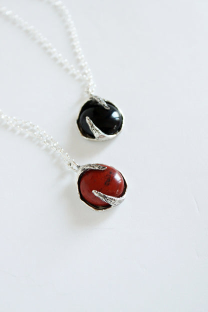 Two stone pendants with black onyx and red jasper