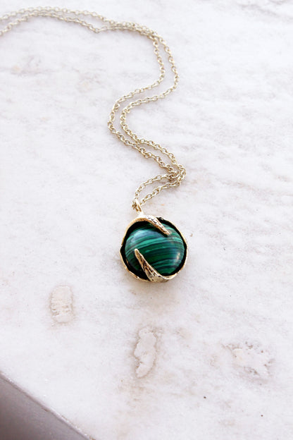 Necklace with a green malachite crystal