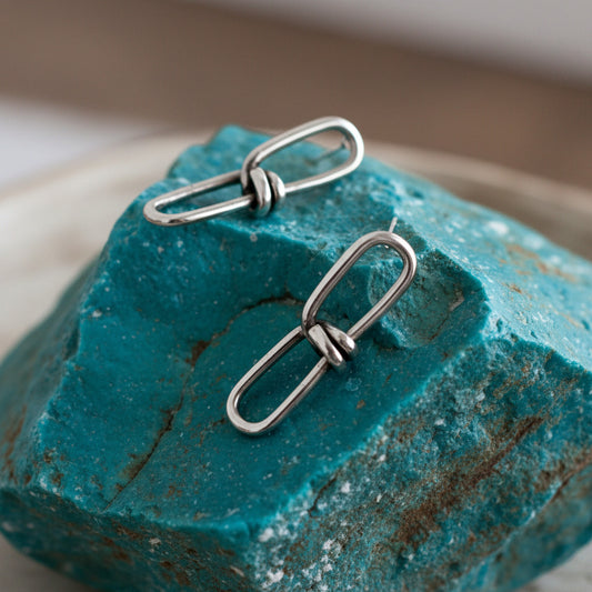 Pair of silver link earrings 