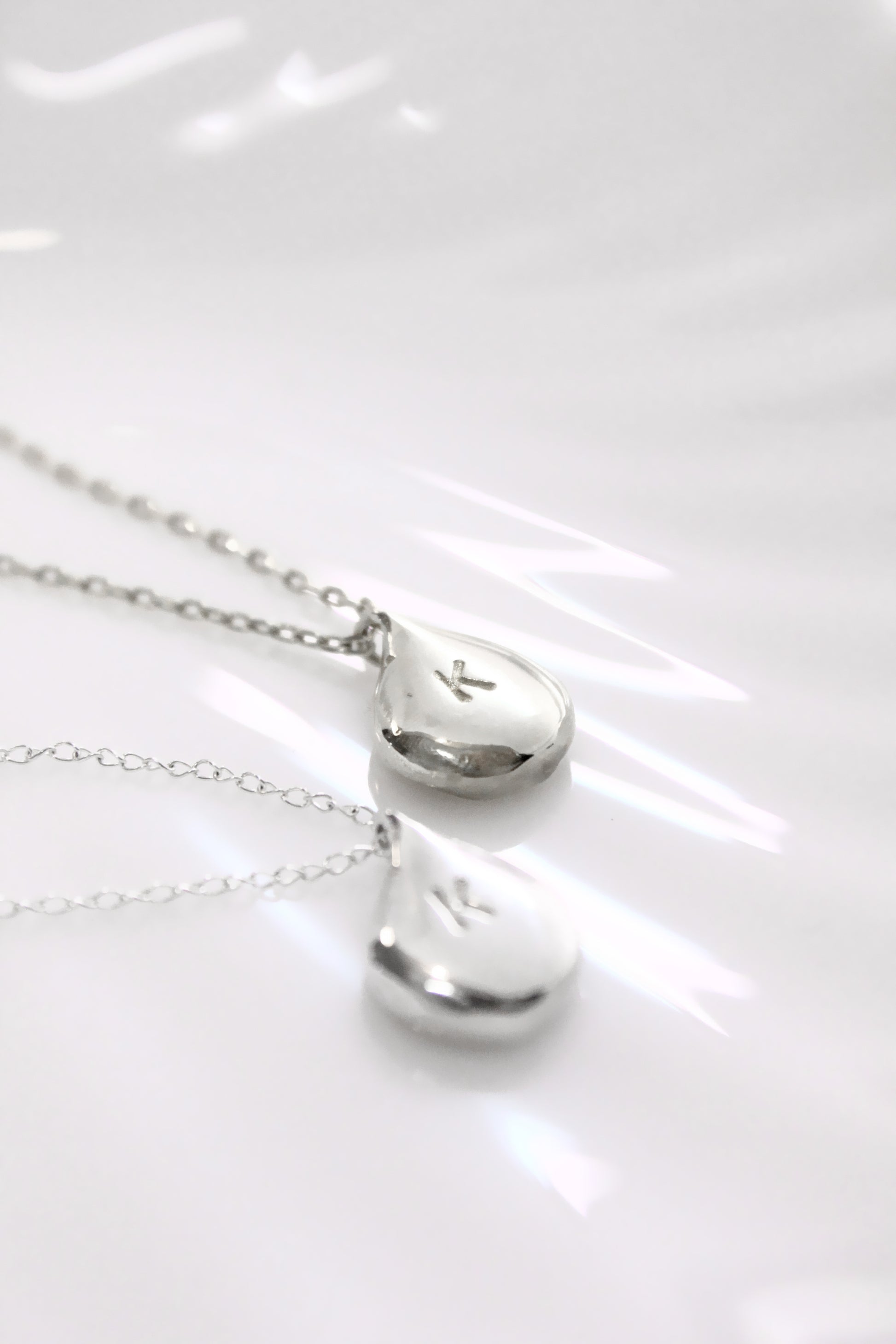 Two silver necklaces with personalized initials monogram 