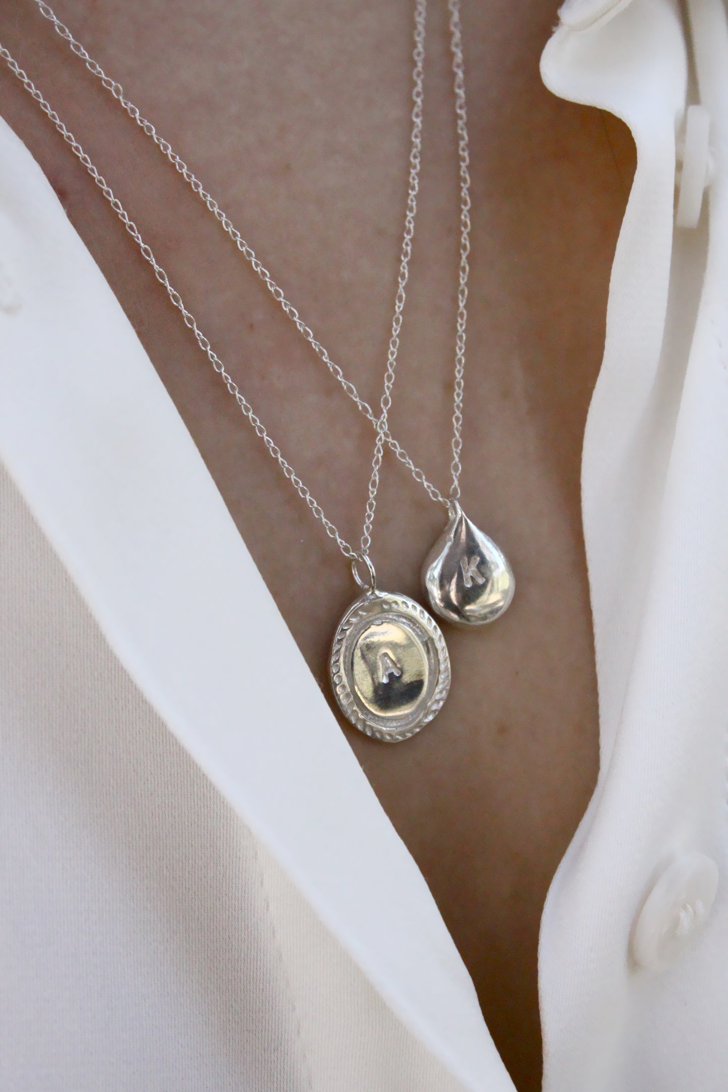 Two silver necklaces with personalized initials monogram necklace