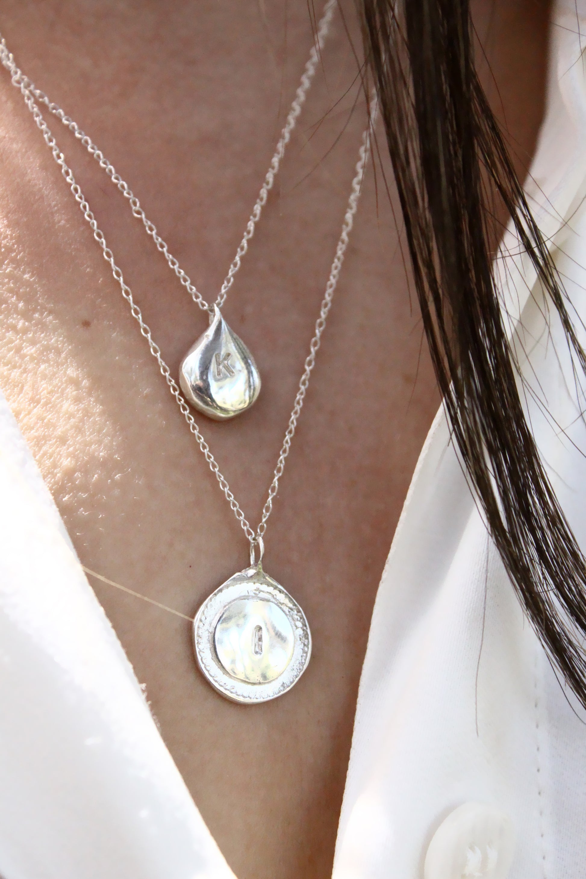two silver personalized initials monogram necklaces