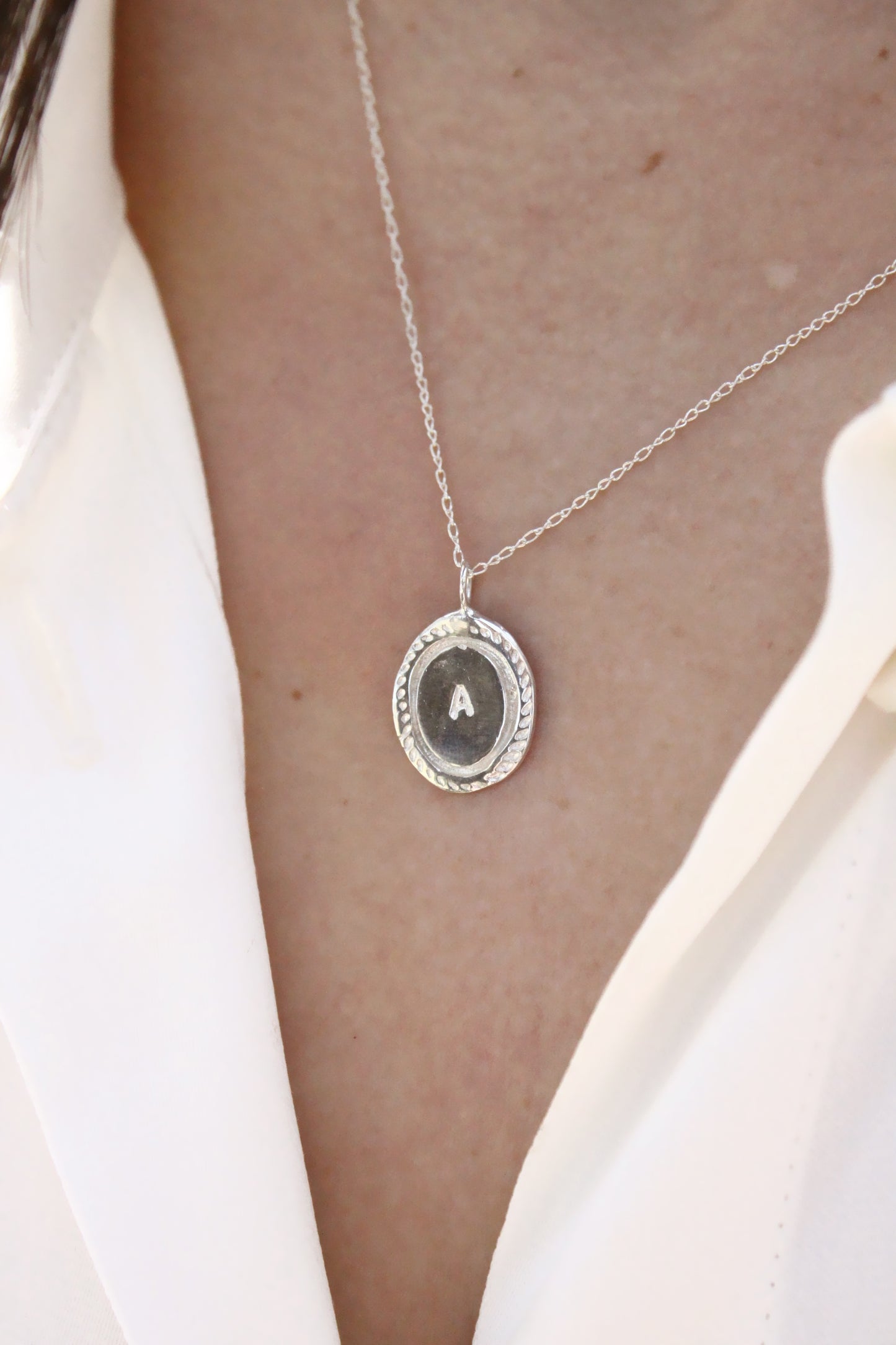 Silver necklace with a round pendant  personalized initials monogram