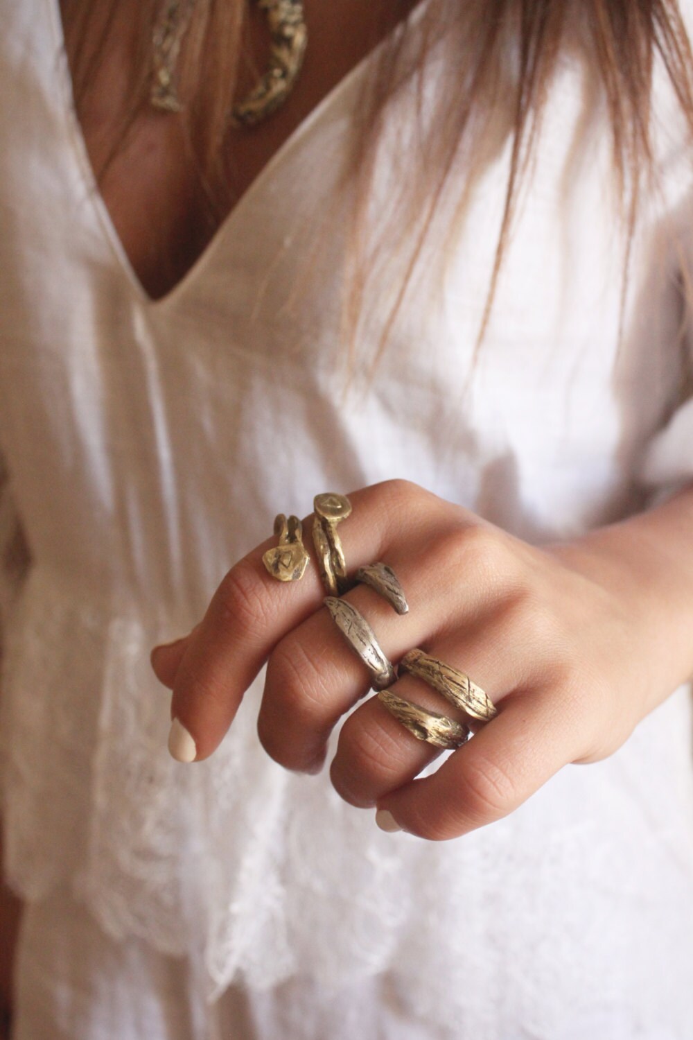 Wrap snake around rings gold and silver