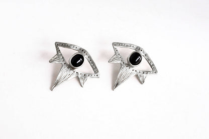 Pair of silver eye-shaped earrings with black onyx 