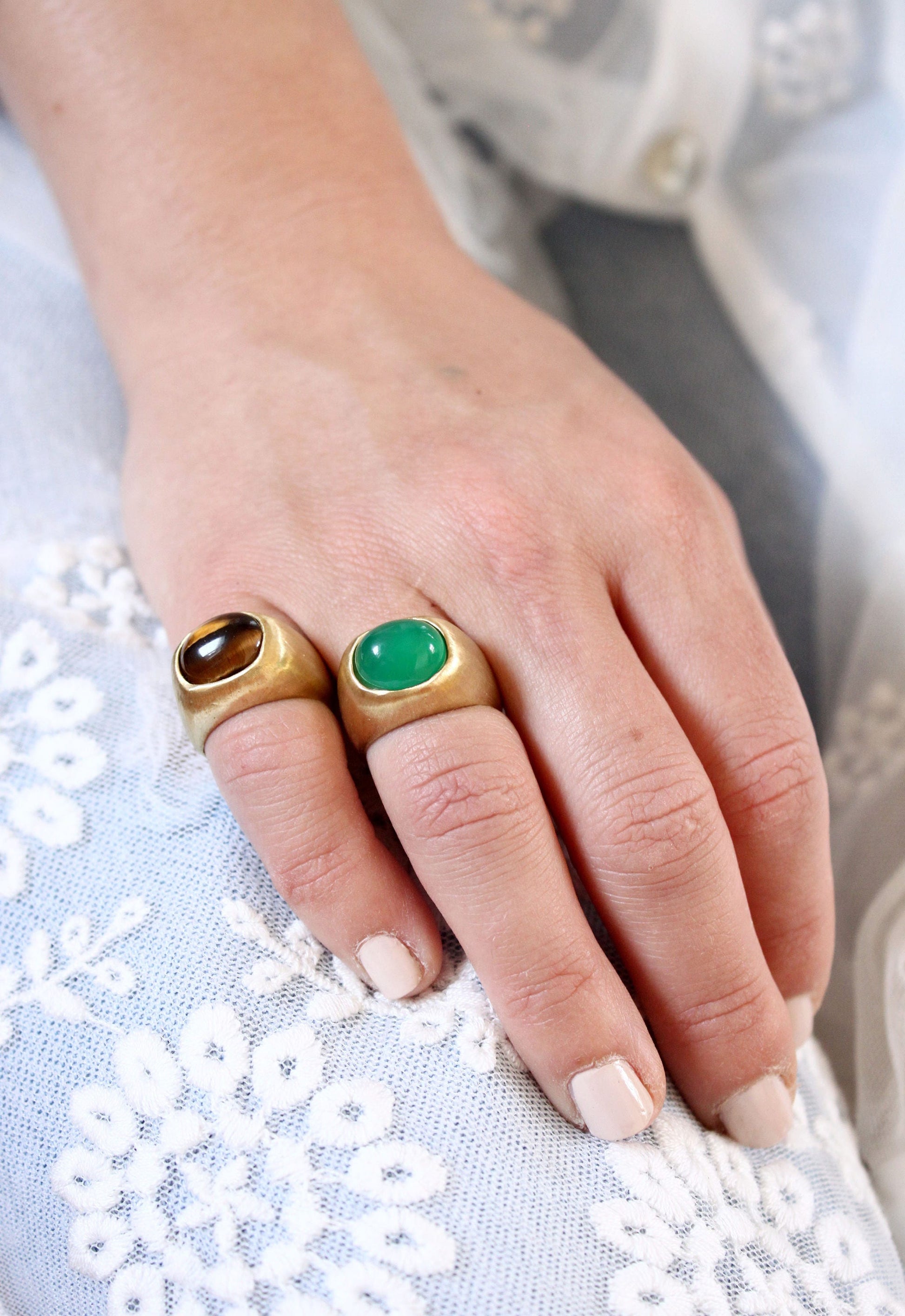  two gold rings with gemstone