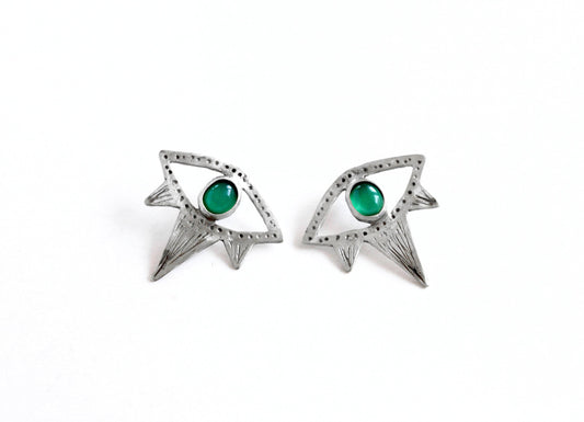 Pair of silver eyes earrings with green gemstones