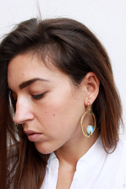 gold earrings with opal stones