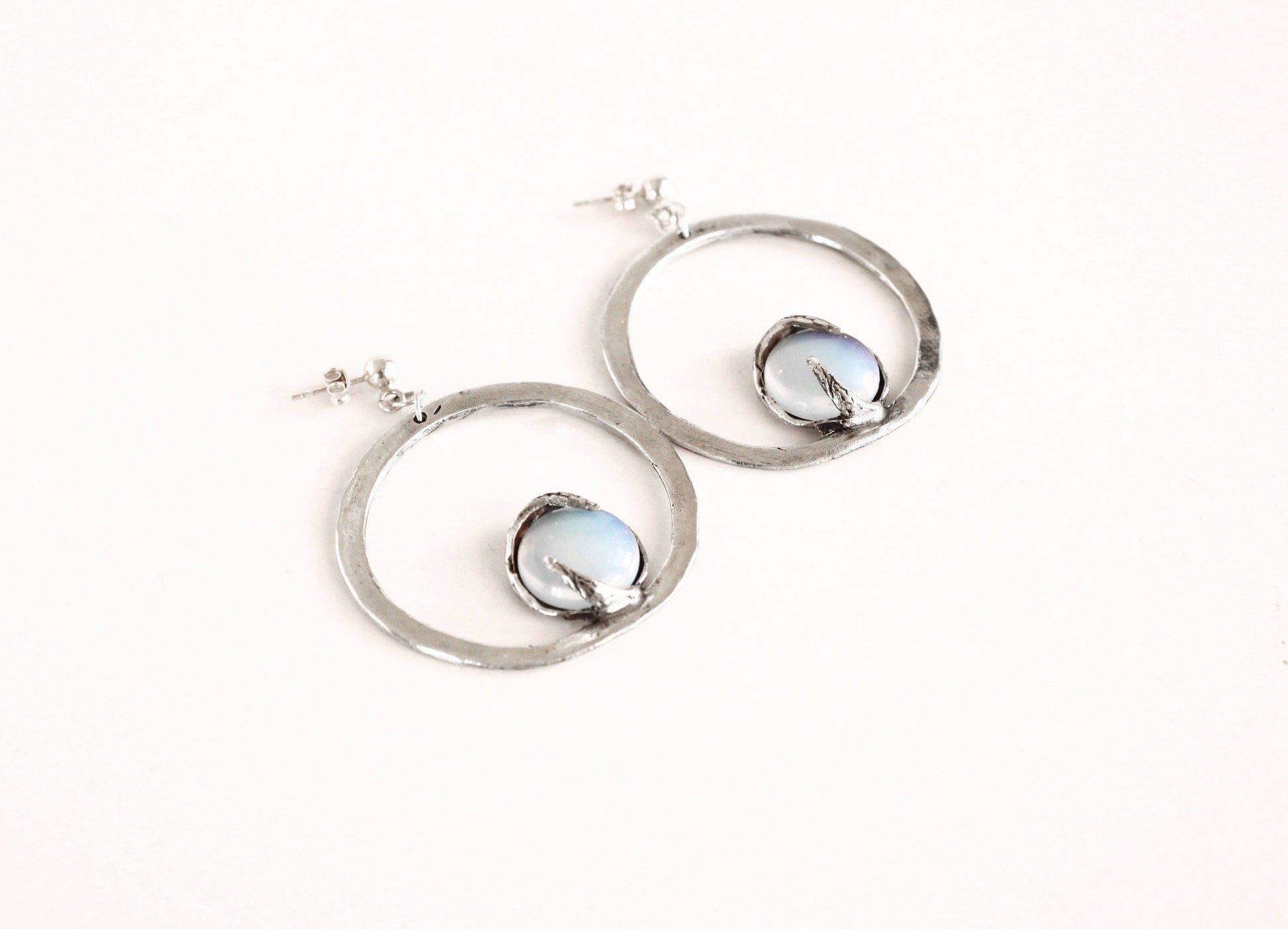 Pair of silver hoop earrings with opal stones 