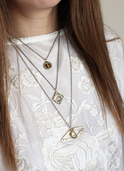 Crystal pendants with moonstone, tigers eye. 