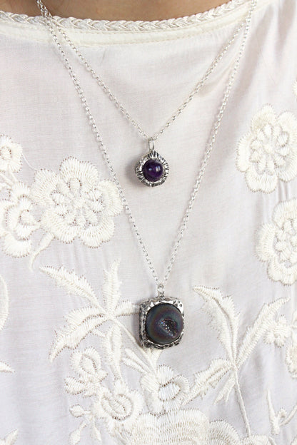 Necklace with purple gemstones