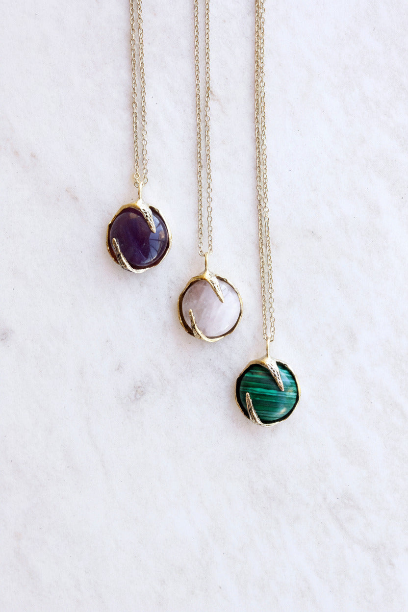 Three necklaces with different crystals gemstones