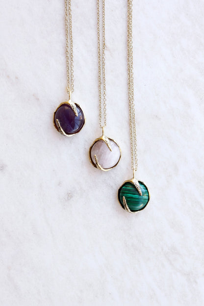 Three necklaces with different crystals gemstones