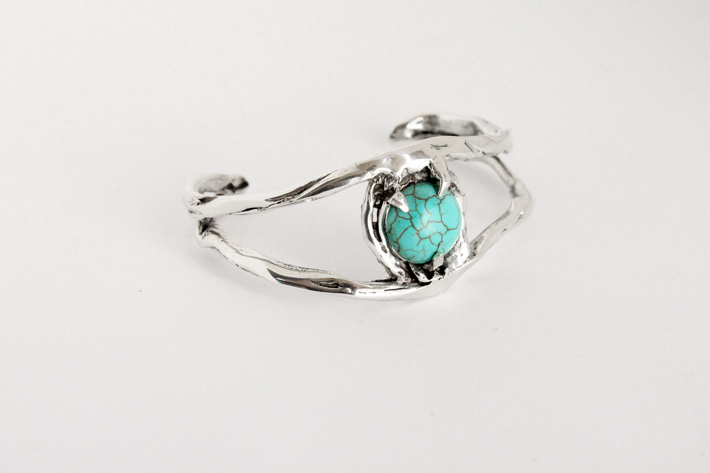 Silver bracelet with a turquoise stone