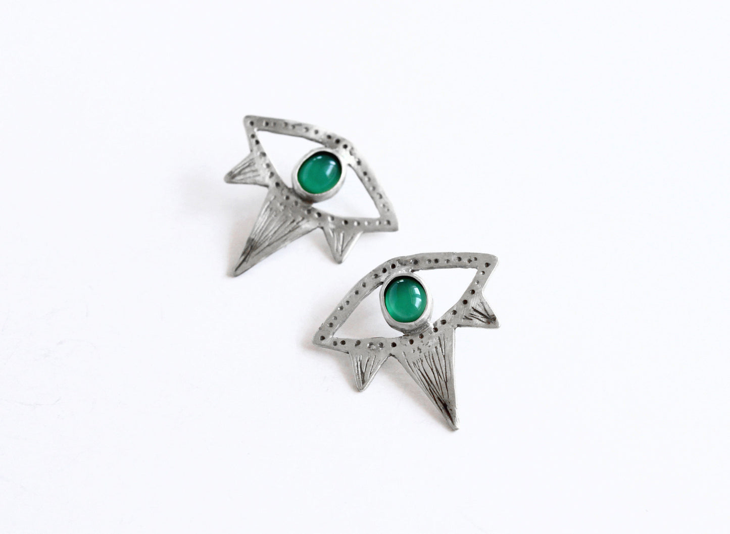 Pair of silver earrings with green gemstones 