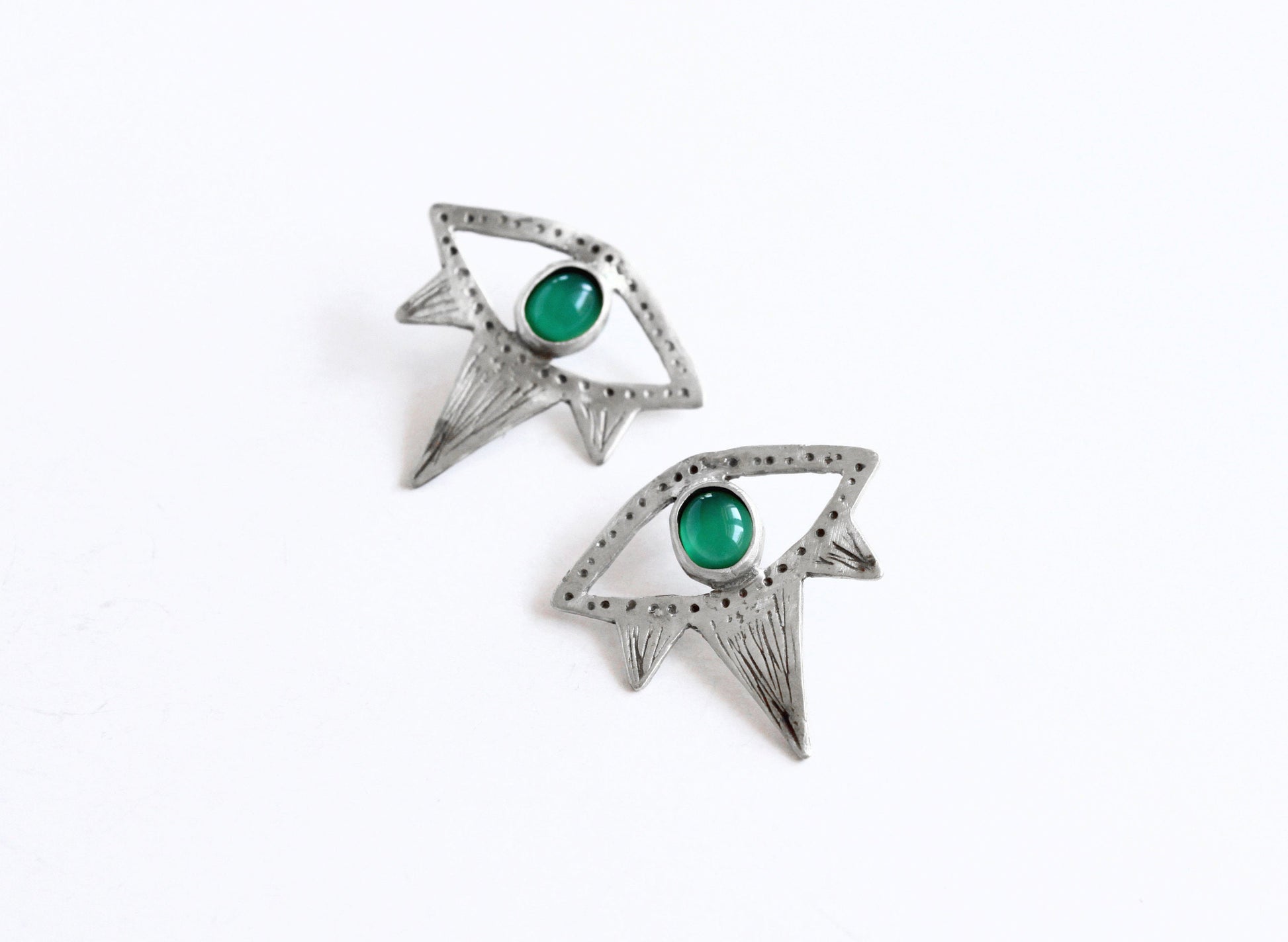 Pair of silver earrings with green gemstones 