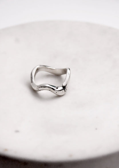 Silver wavy molten liquid ring minimal