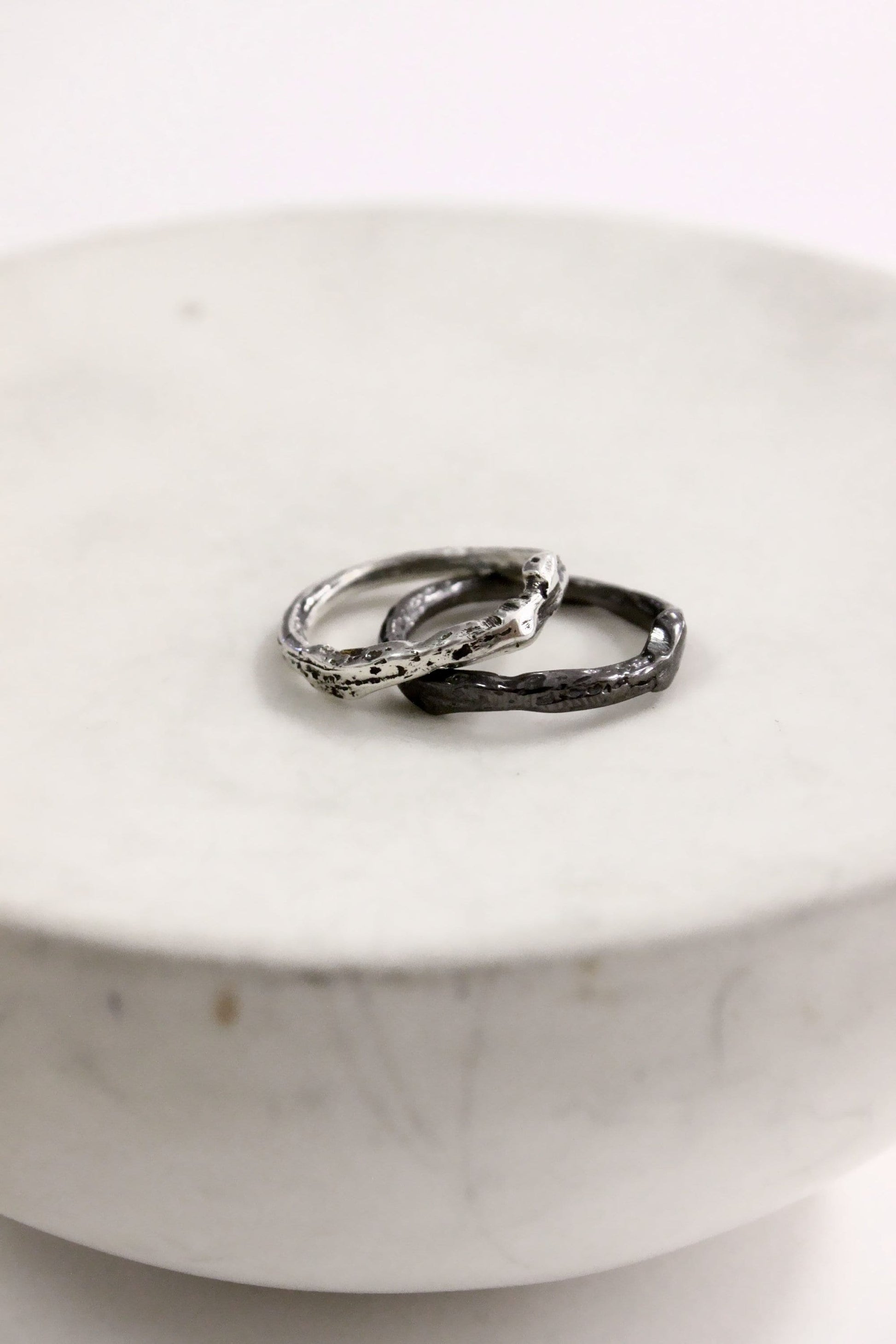 Two silver rings black plated