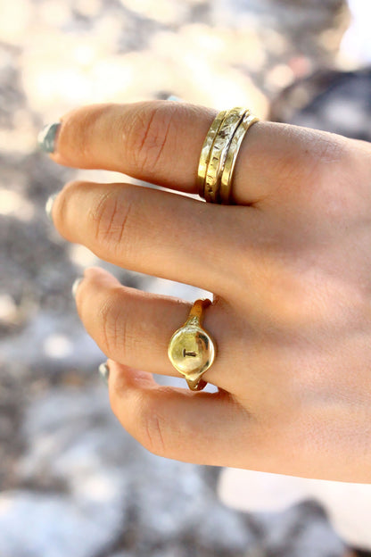  two gold rings with personalized monogram letter 